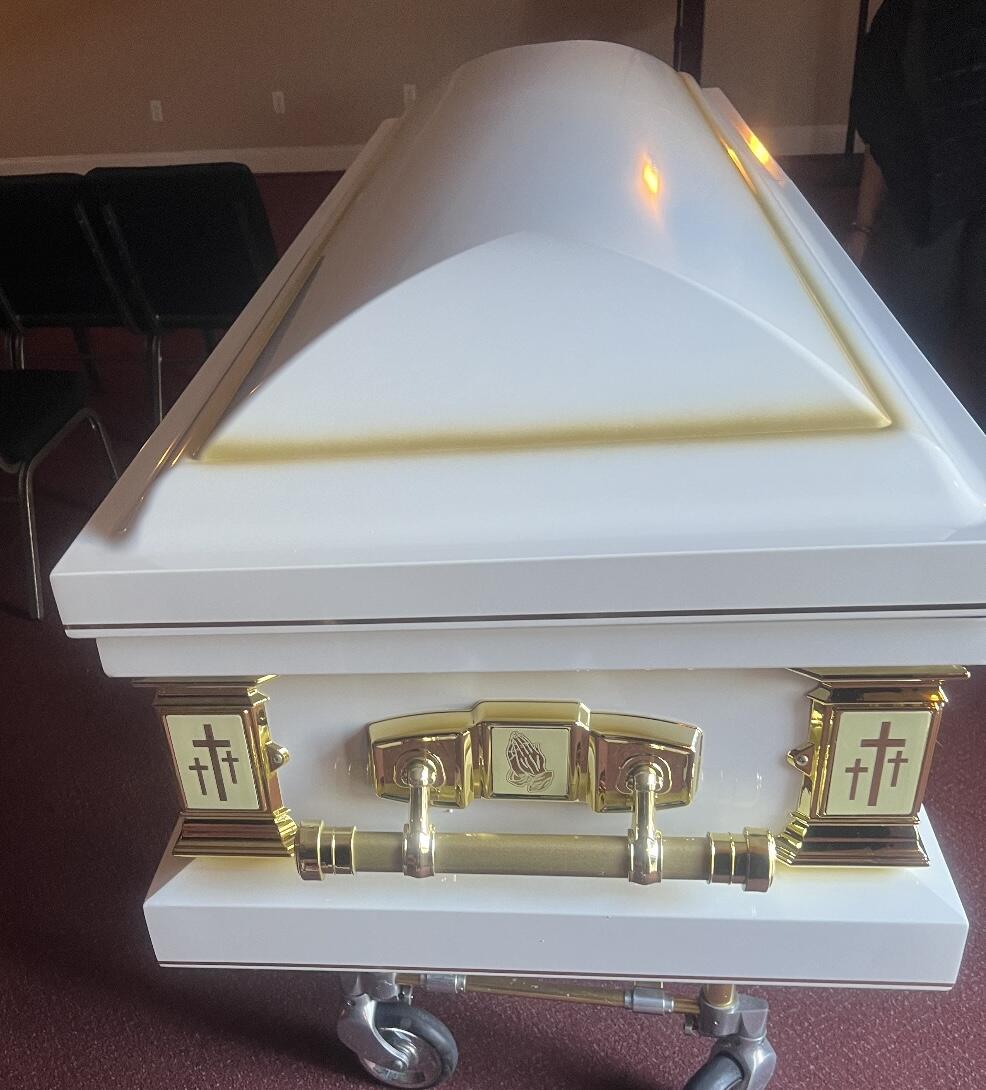 Casket Emporium Series Golden Cross Full Couch photo review