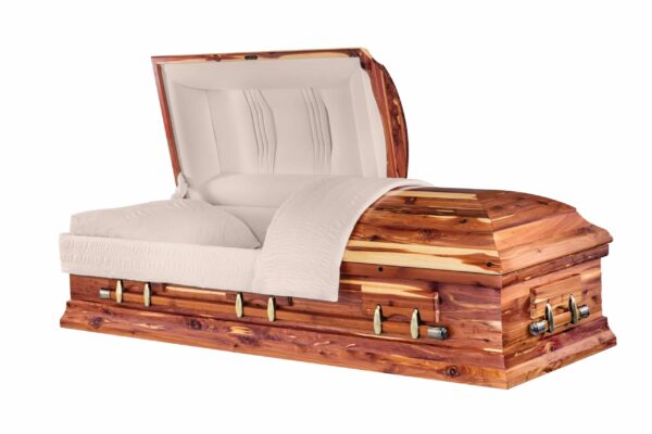 Open cedar casket with polished wood, showcasing plush white interior lining. The elegant design conveys a sense of peace and dignity.