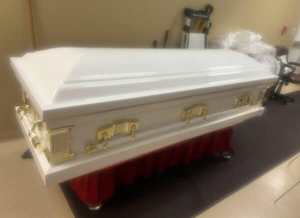 Casket Emporium Series Golden Cross Full Couch photo review